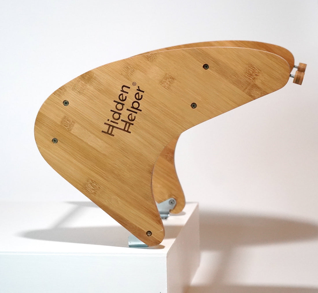 HiddenHelper in the process of being put away on a white background