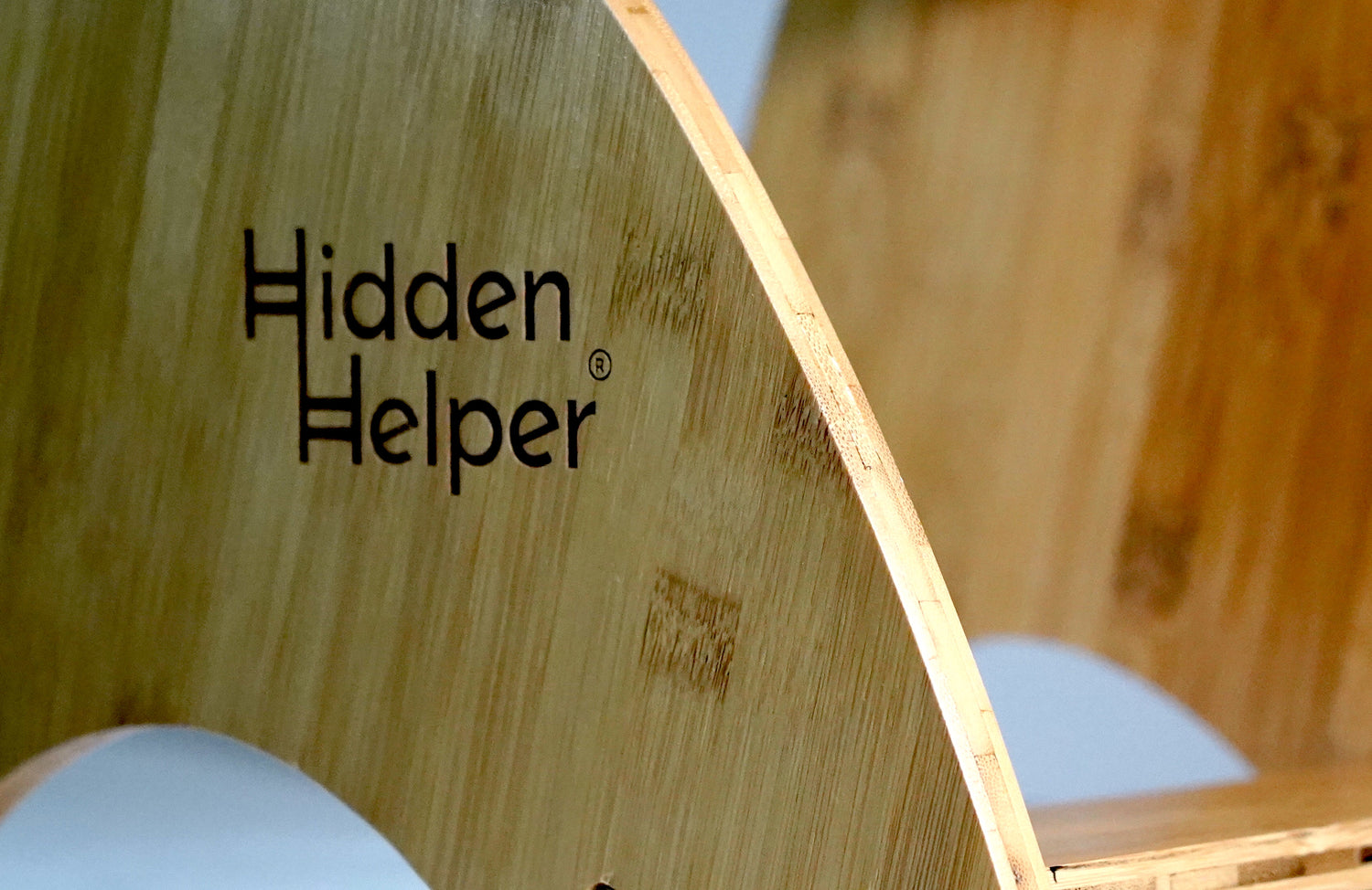 Close up of the HiddenHelper logo on the side of the stool upright